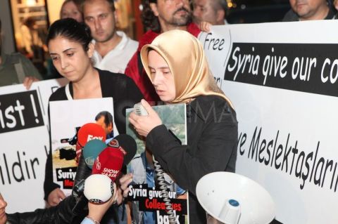 1347999788-protest-held-for-journalists-arrested-in-syria-at-syrian-consulate_1457888